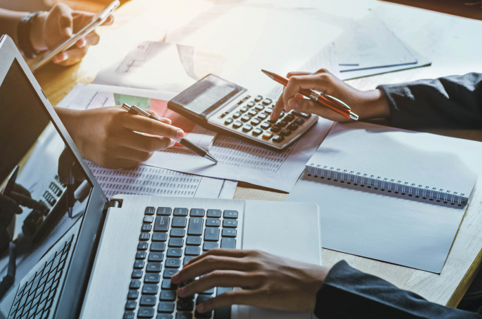 An accountant making calculations