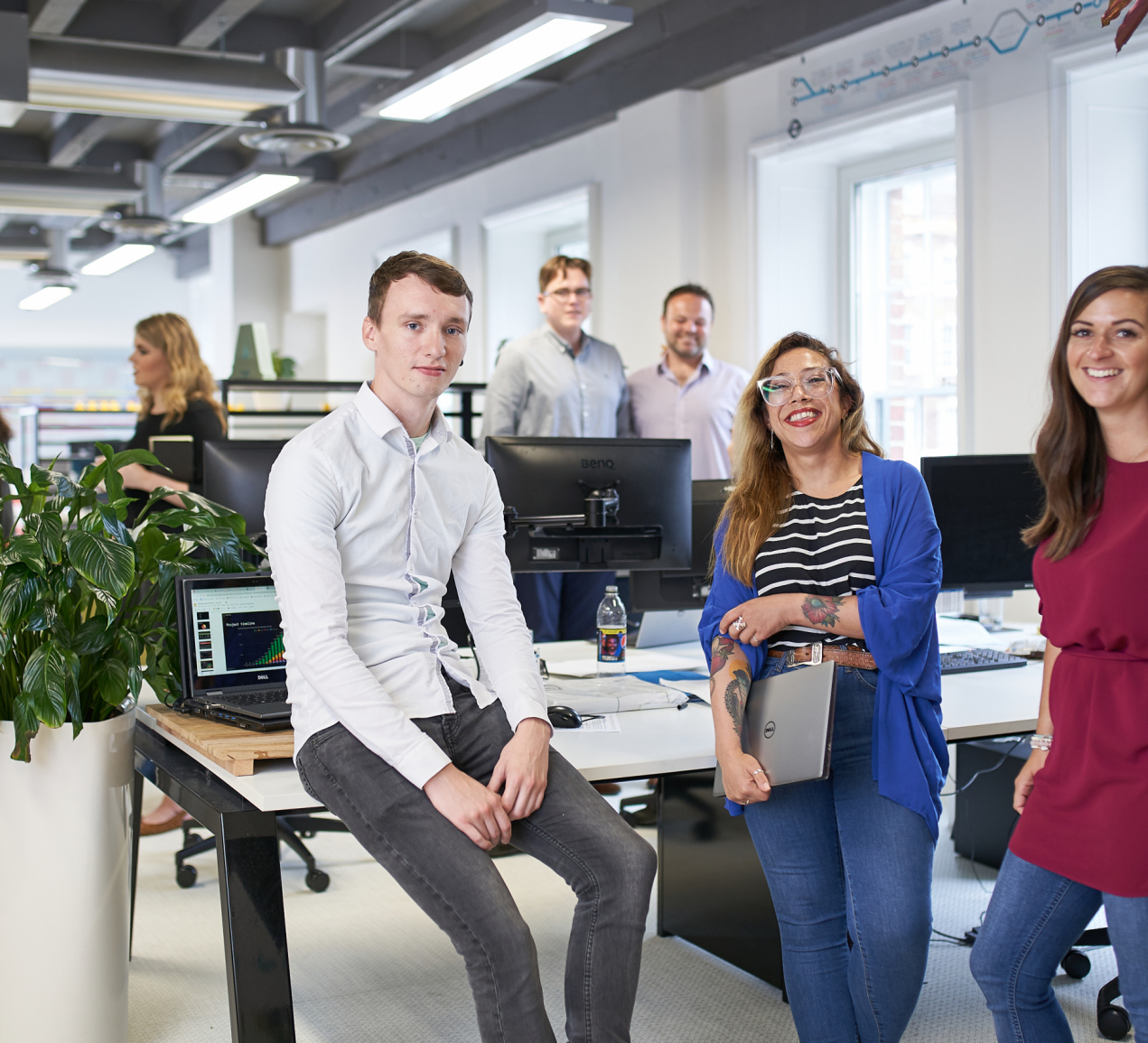 Helastel team smiling at camera